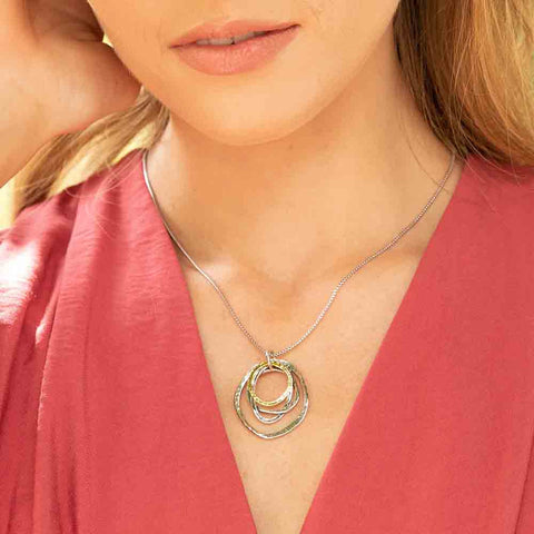 Woman wearing Danny Newfeld Sterling Silver Organic Dangle Pendant